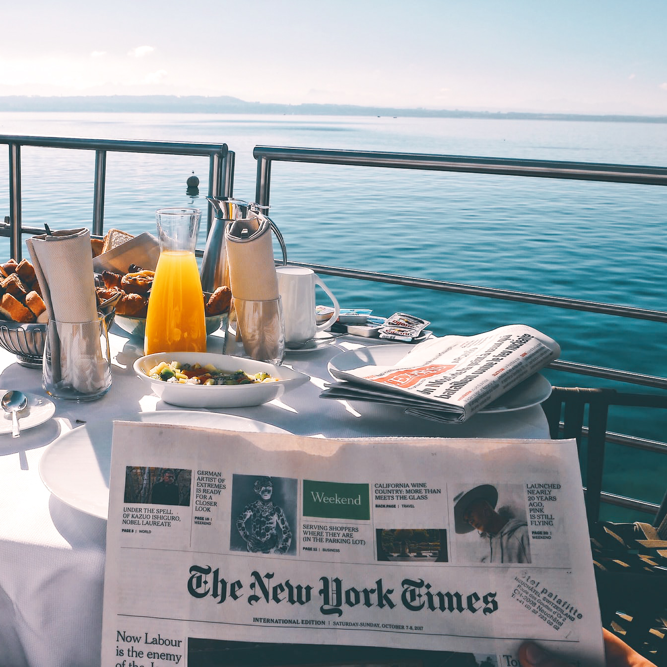 Table with breakfast on a boat in the ocean